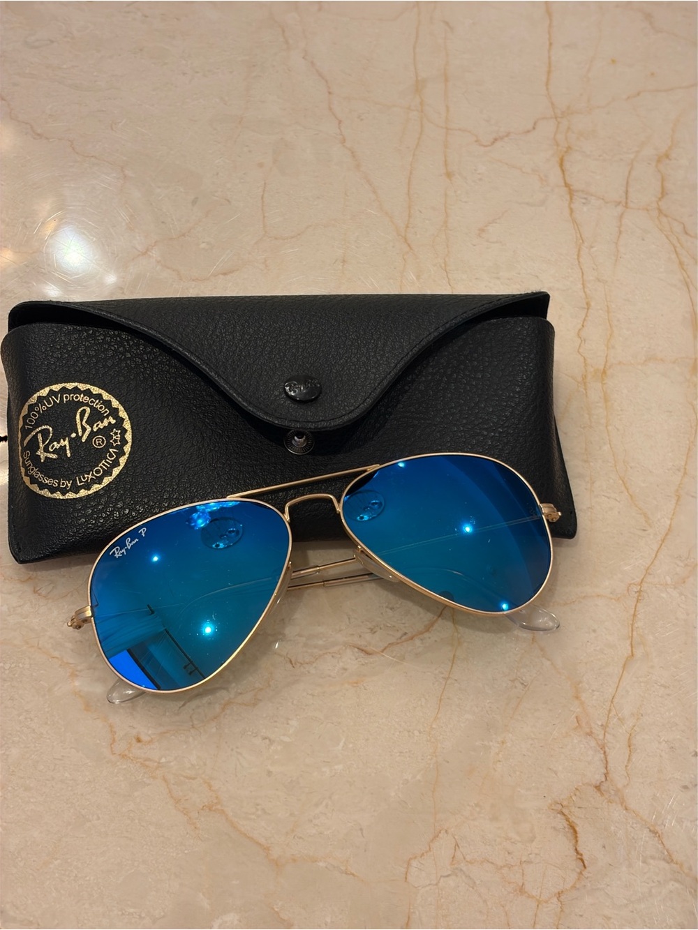 Ray-Ban Aviator Sunglasses with Blue Lenses and Gold Frame